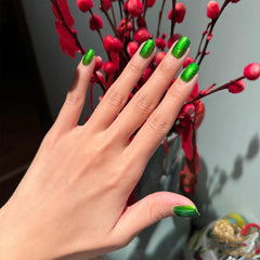 COSMOO painted nail on hand demonstrating natural-light shine benefit