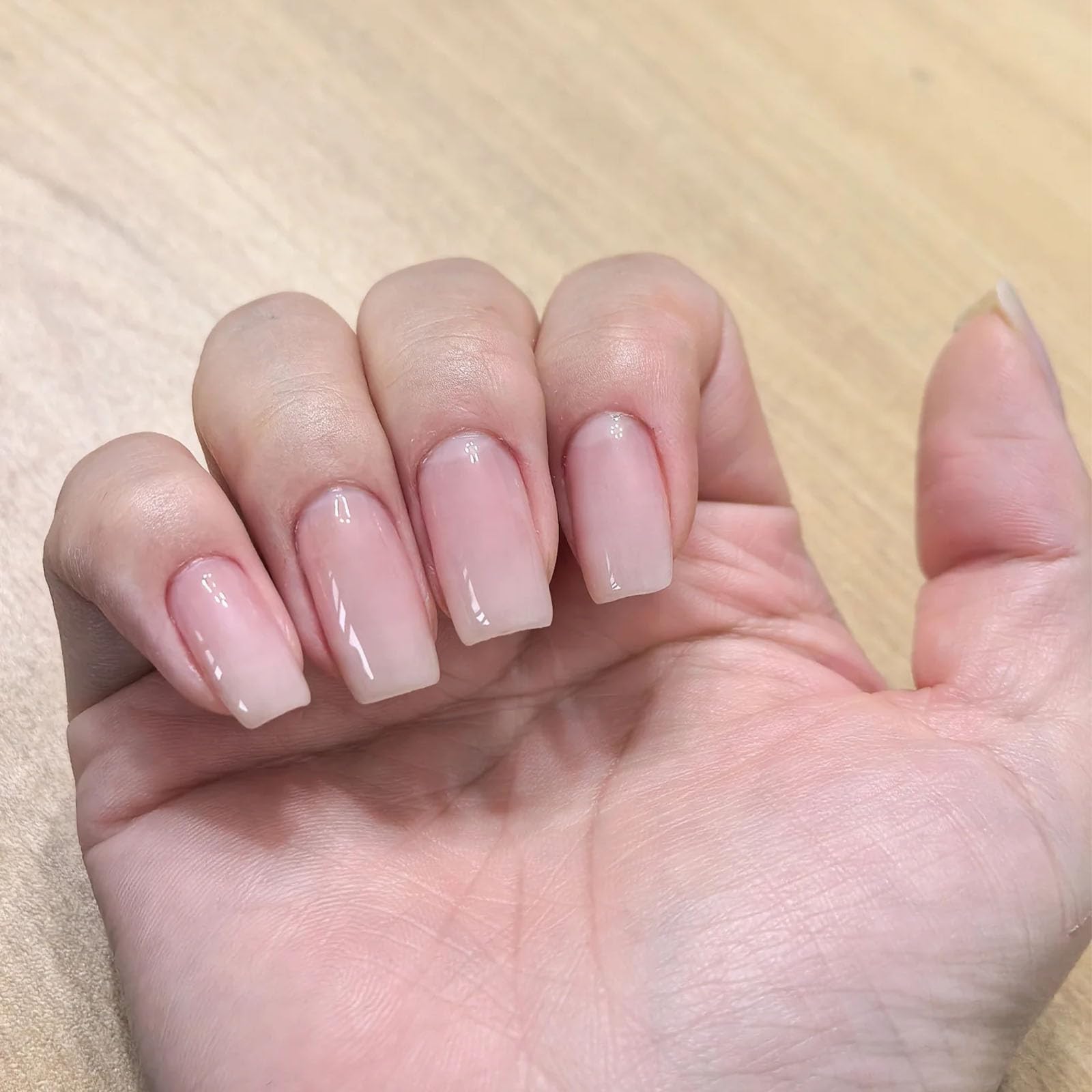 COSMOO polish applied during a home manicure for quick drying