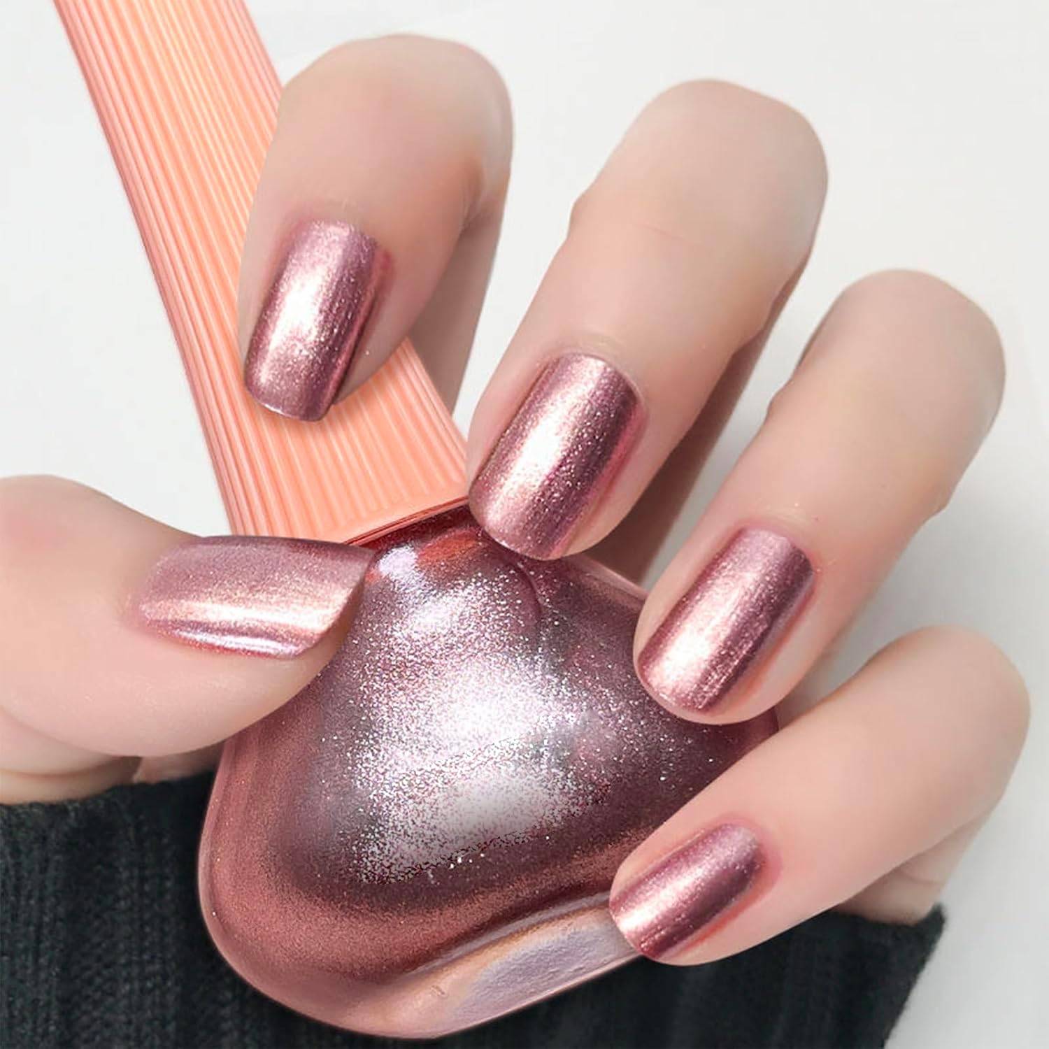 COSMOO nails in evening outfit scene showing festive, eye-catching sparkle