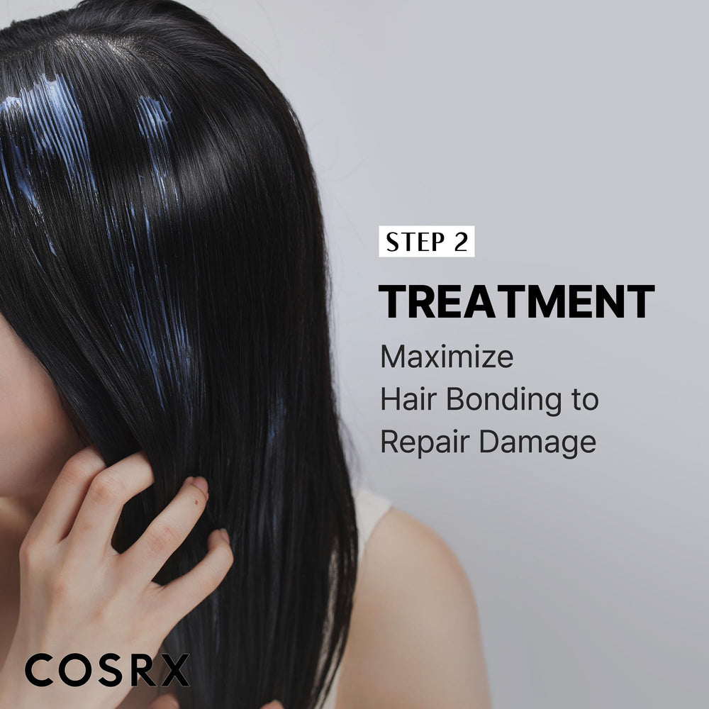 Running oil through damp hair, COSRX smoothing and detangling benefit