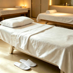 COTELEEC slippers displayed on hotel bed conveying professional guest-ready presentation