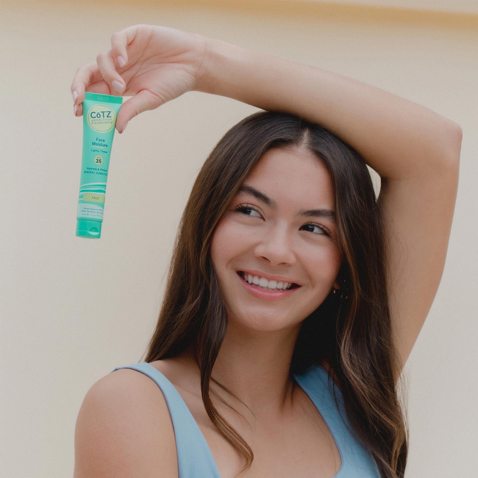 CoTZ tube in hand showing scale and travel-friendly convenience