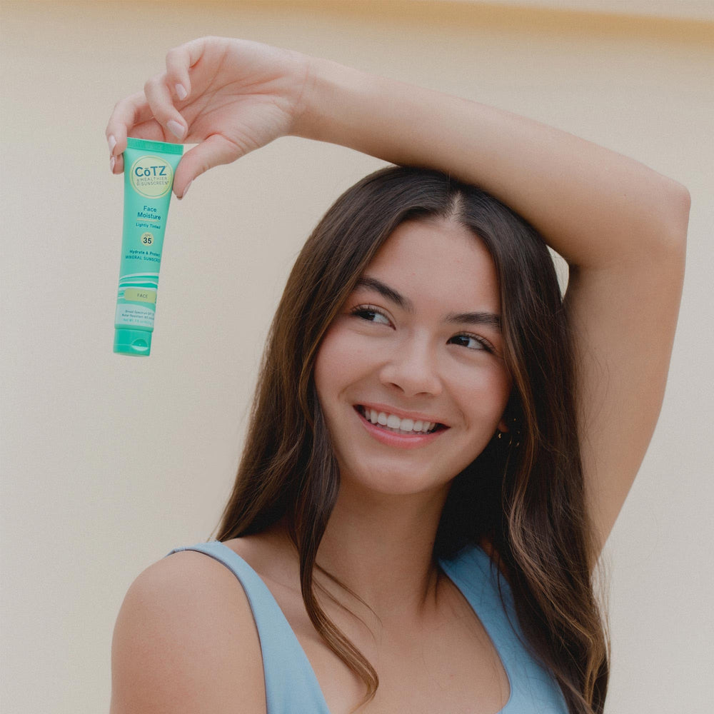 CoTZ tube in hand showing scale and travel-friendly convenience