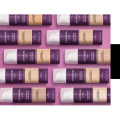 COVERGIRL 1 fl oz bottle next to a ruler showing compact, travel-friendly size
