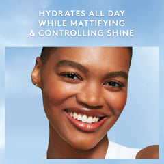 COVERGIRL moisturizer on fingers showing easy spread and absorption