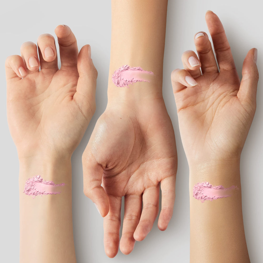 COVERGIRL powder applied with puff on hand demonstrating quick on-the-go shine control