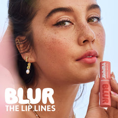 COVERGIRL applied on model lips demonstrating blurred soft-focus finish