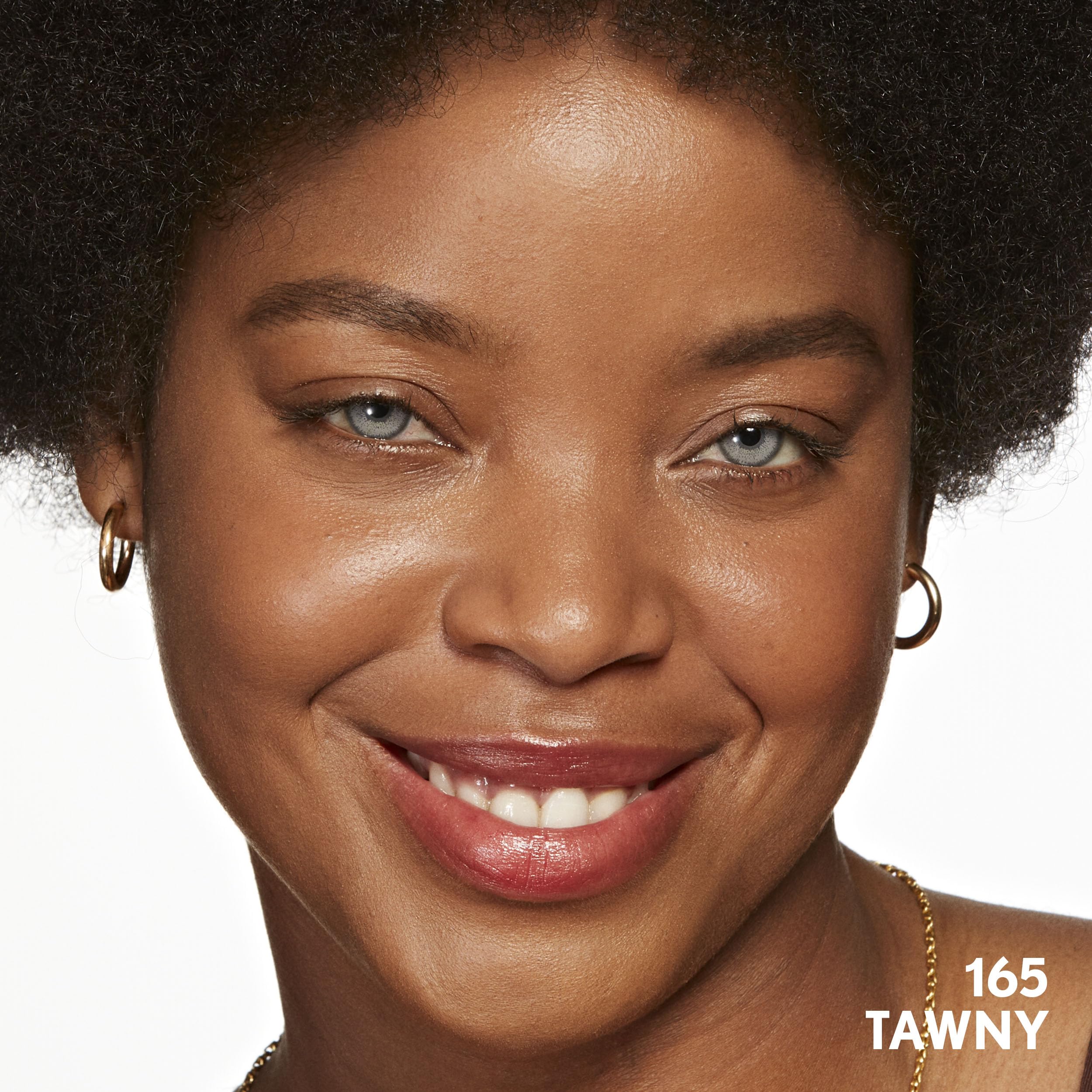 COVERGIRL tube beside a coin showing 1oz travel-friendly size advantage