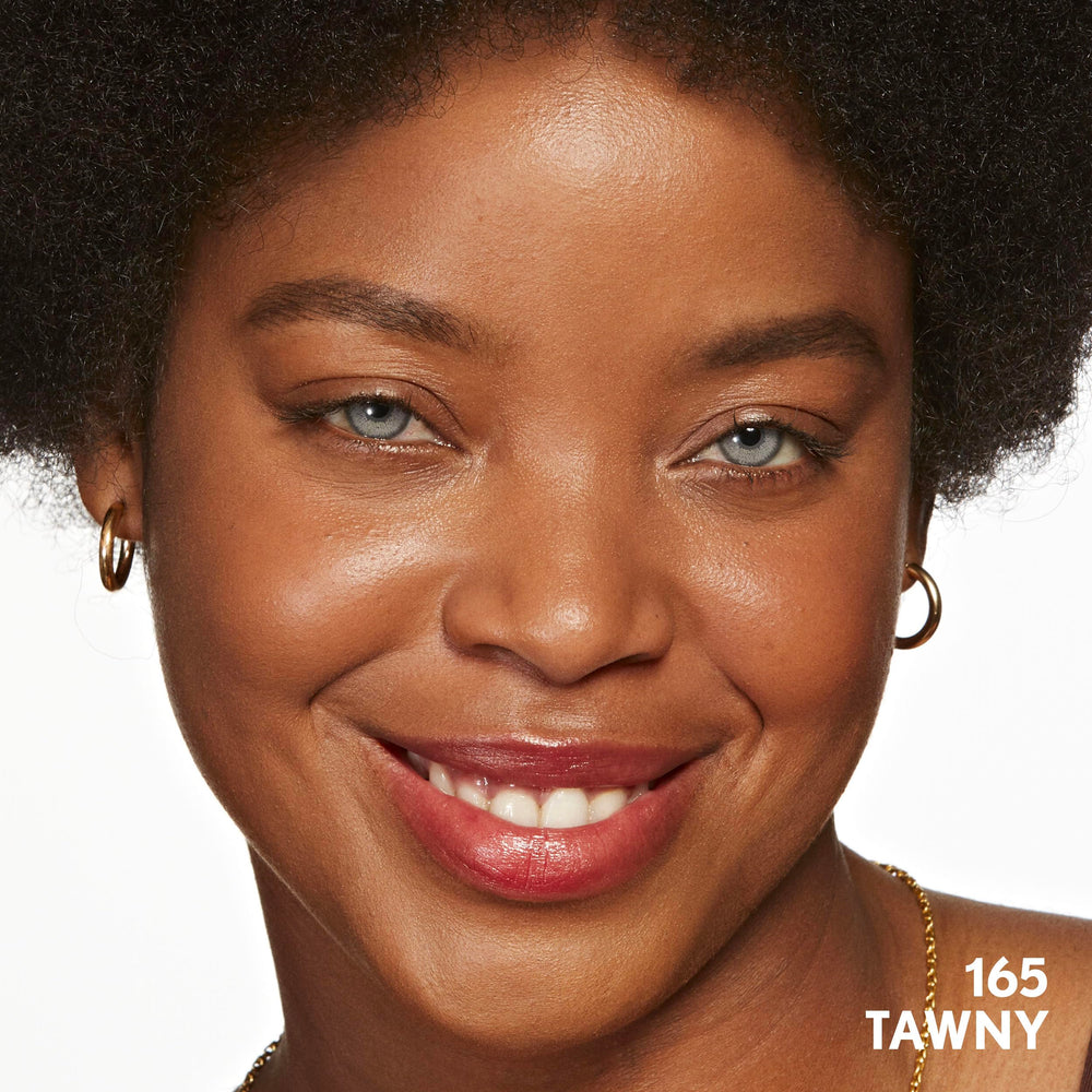 COVERGIRL tube beside a coin showing 1oz travel-friendly size advantage