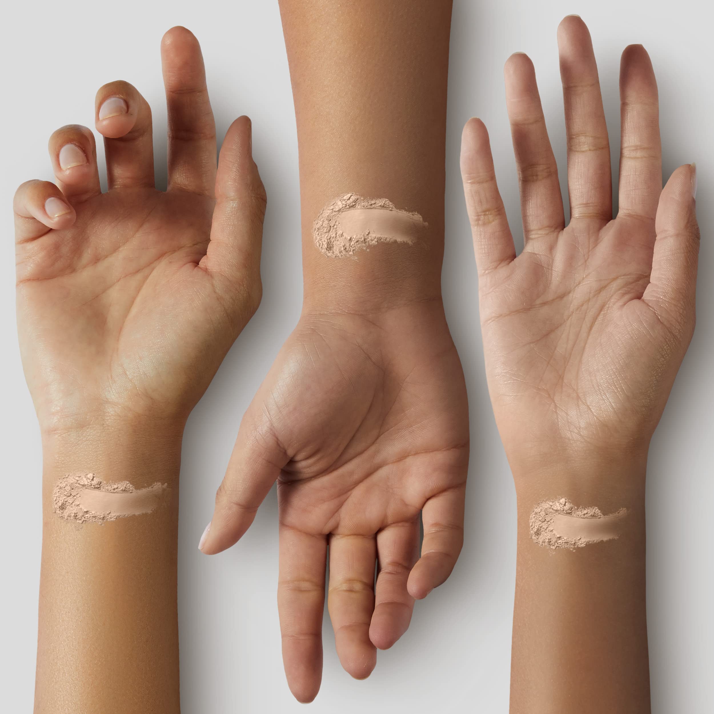 COVERGIRL compact held in hand to show travel-friendly size and portability