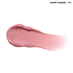 COVERGIRL swatch on forearm showing creamy pink shine and buildable coverage