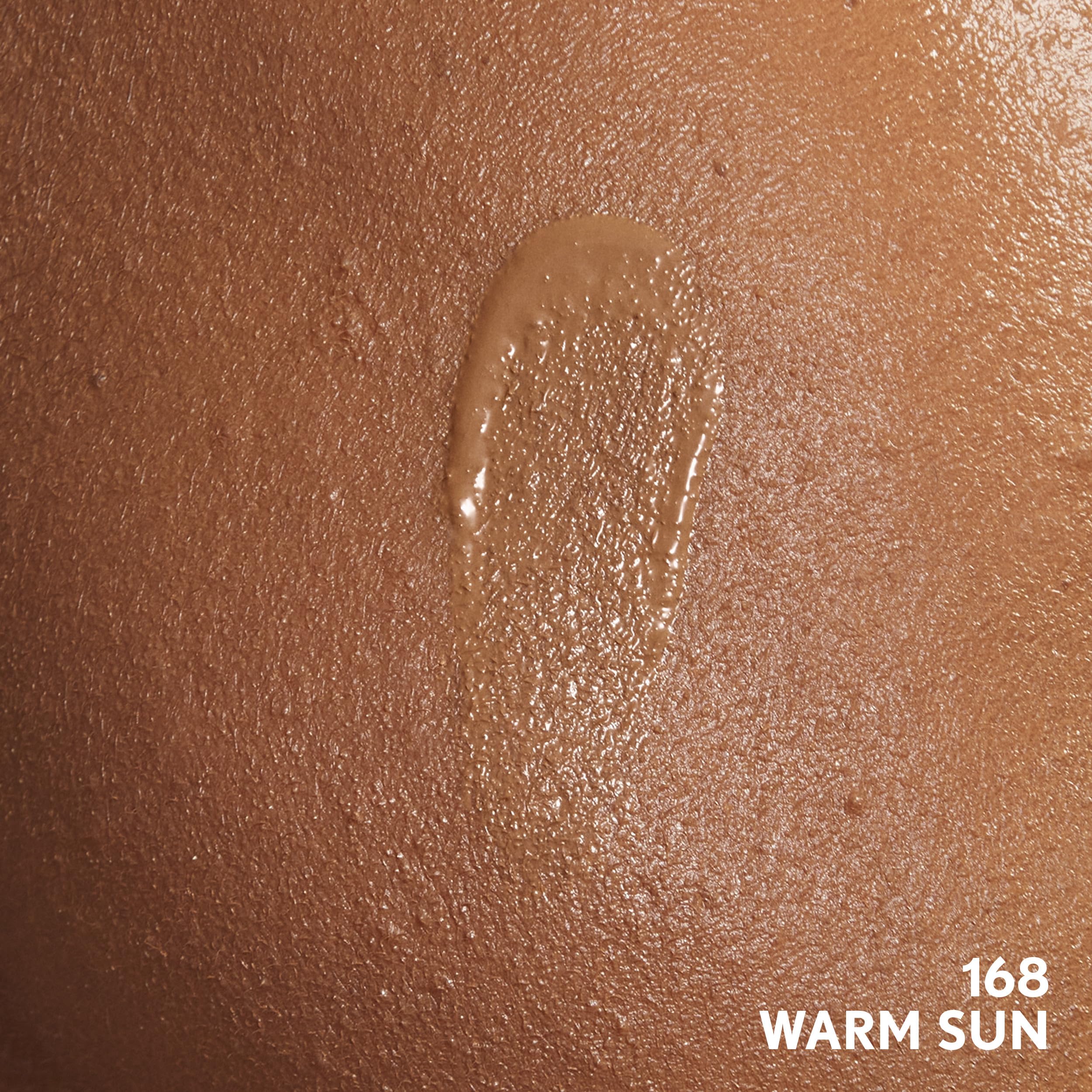 COVERGIRL swatches on forearm displaying Warm Sun shade and buildable coverage options