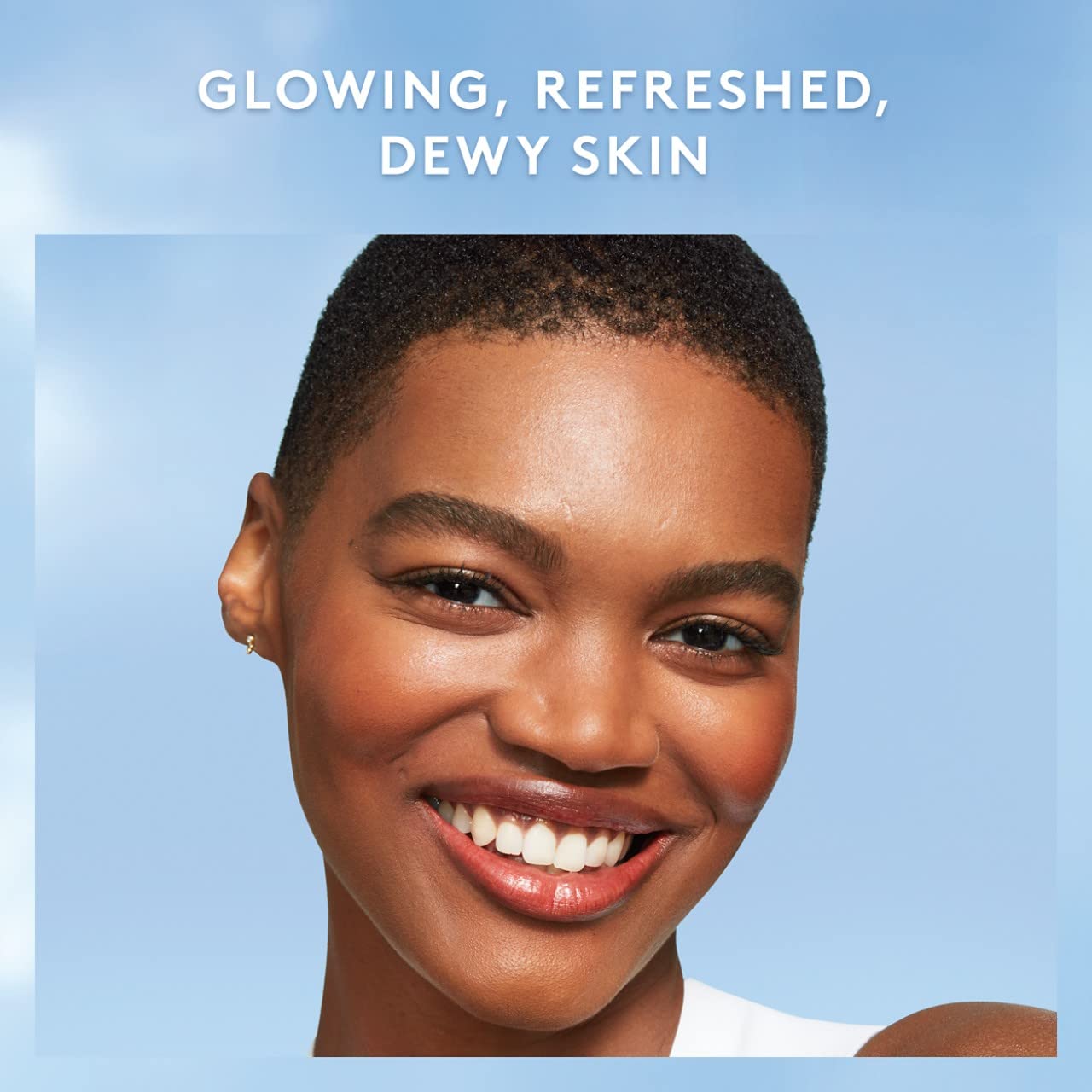 COVERGIRL bottle in hand showing 3.3 fl oz size and portability