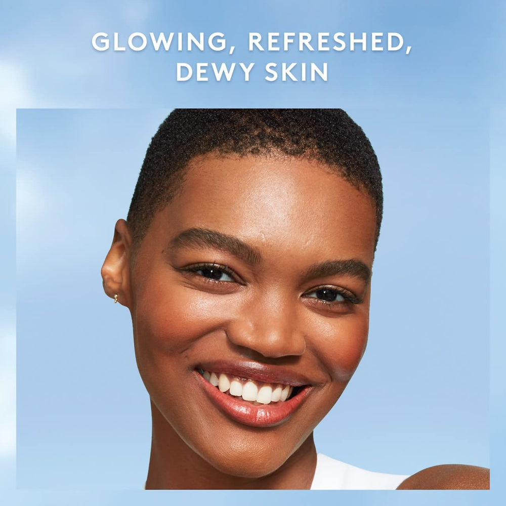 COVERGIRL bottle in hand showing 3.3 fl oz size and portability