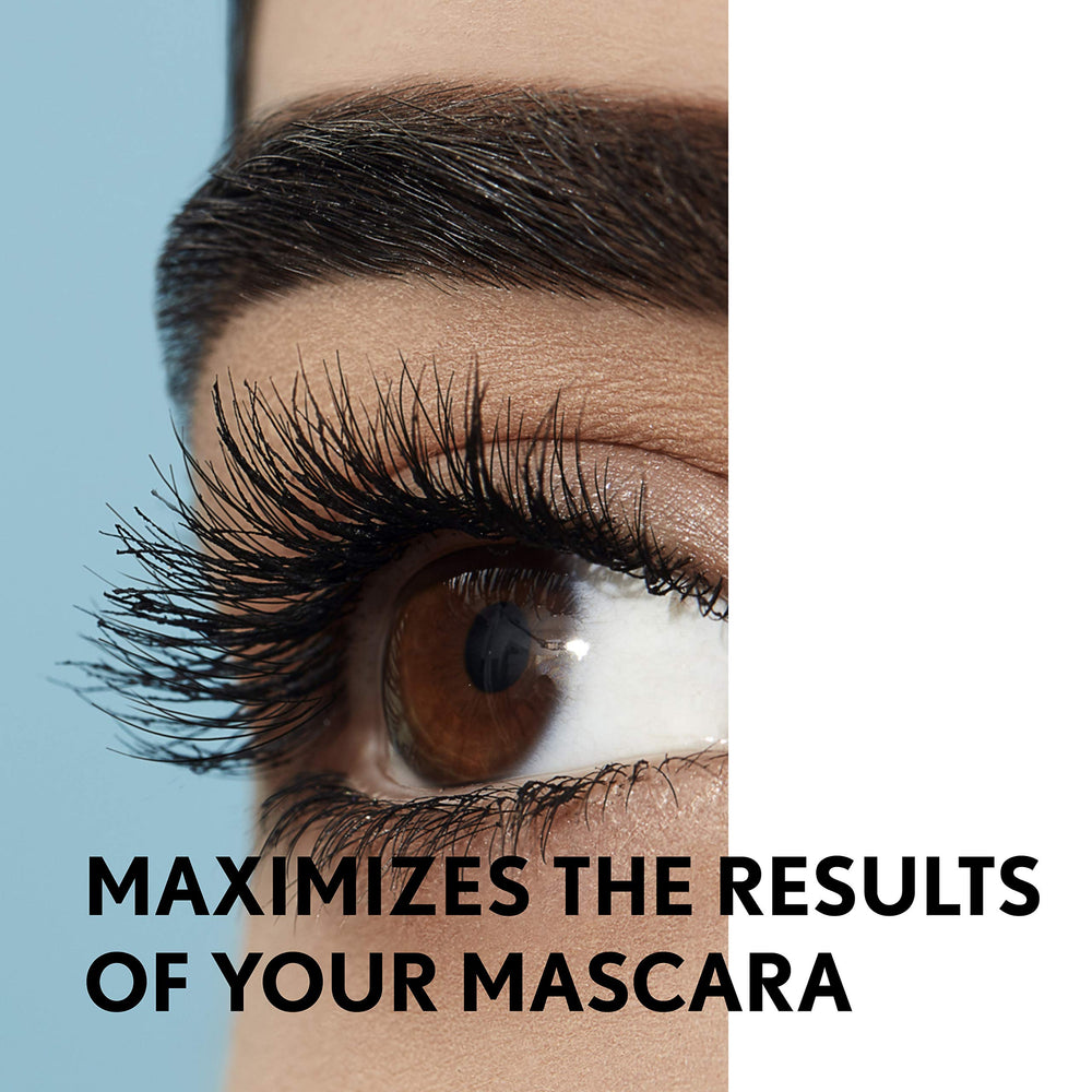 COVERGIRL lifestyle shot with makeup tools and primer, ready for amplified lashes
