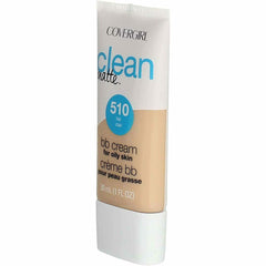 COVERGIRL 1 oz tube beside ruler showing compact travel-friendly size and convenience