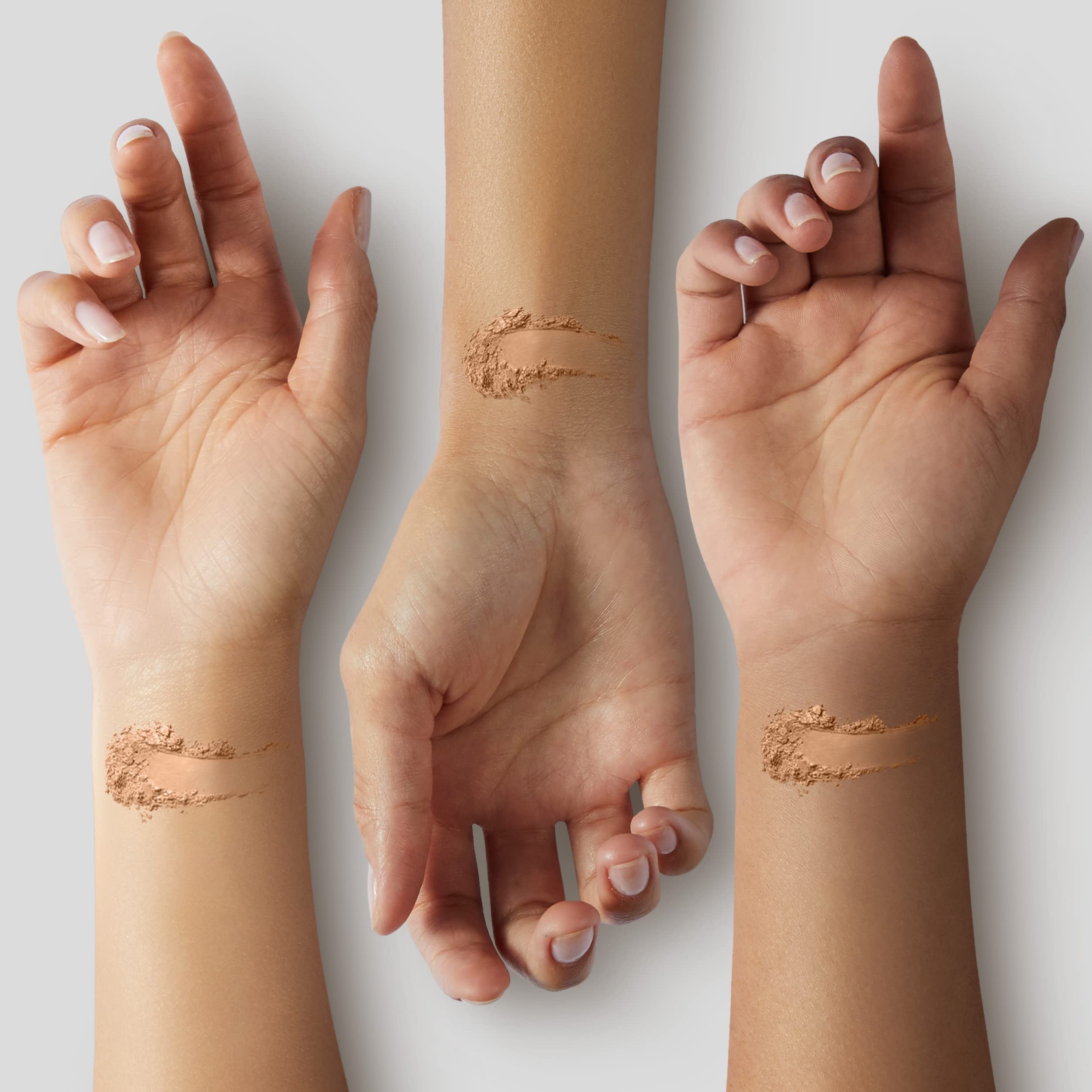 COVERGIRL compact held in hand to show scale and convenient on-the-go benefit