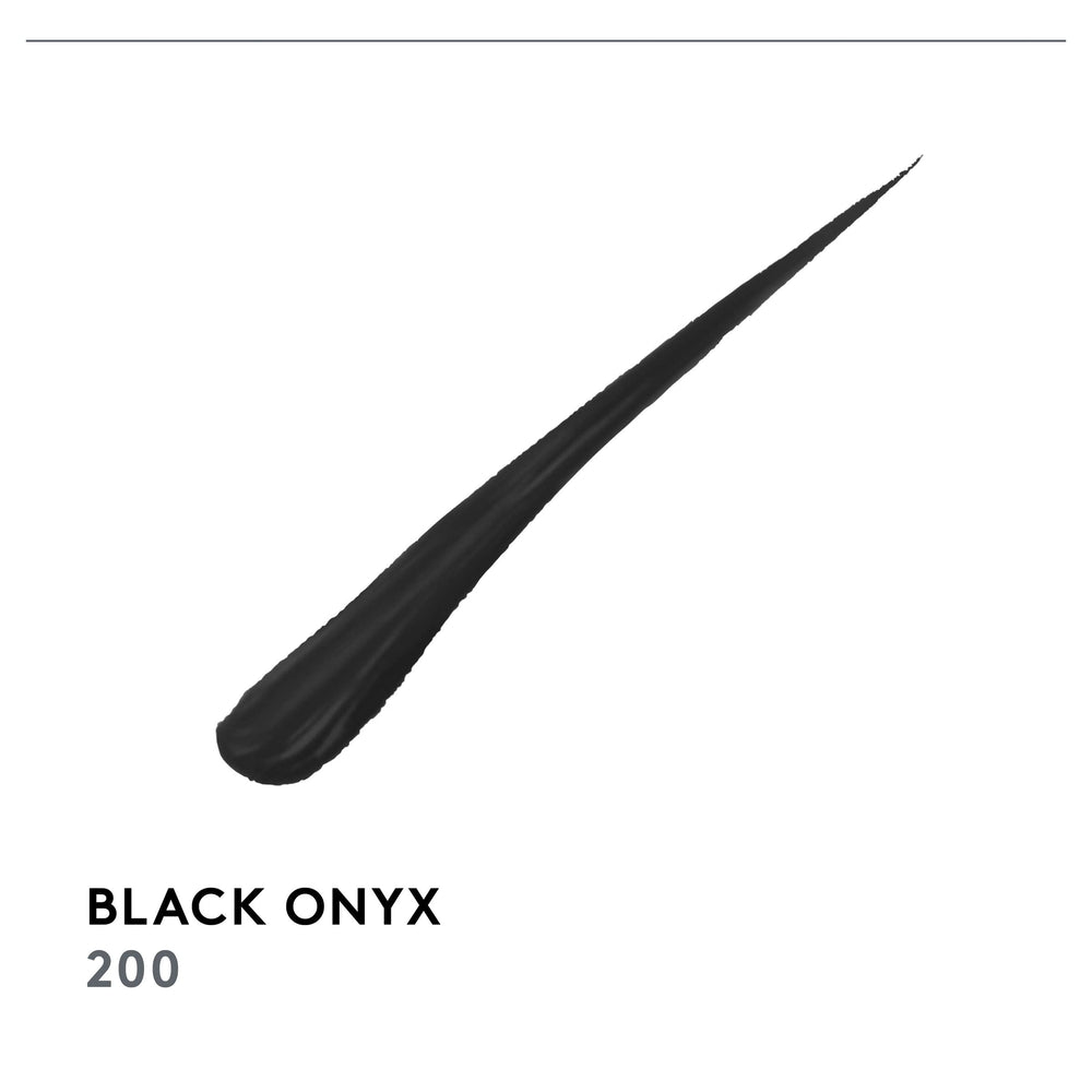 COVERGIRL liner next to coin showing compact size and travel-ready convenience
