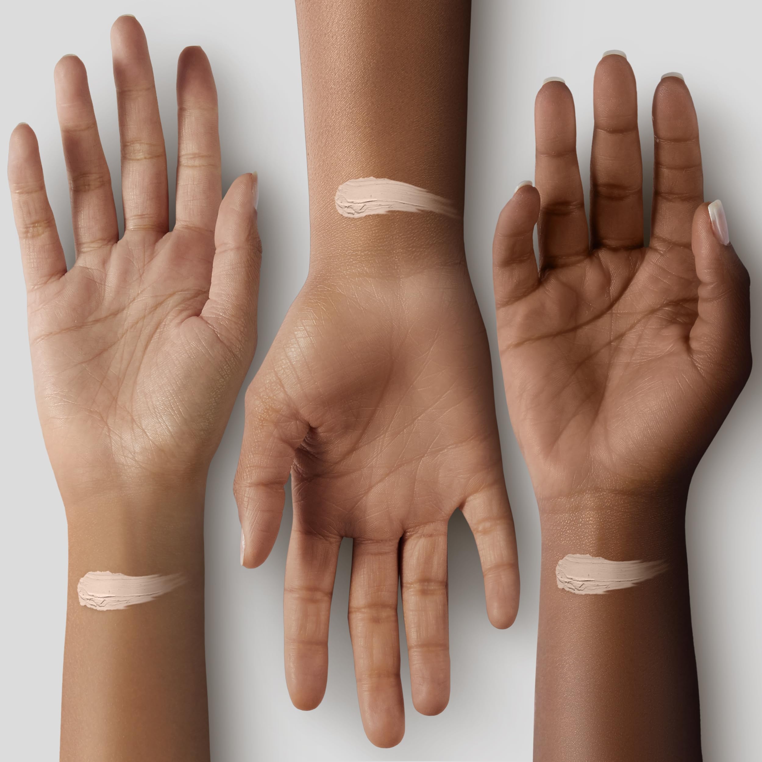 COVERGIRL Smoothers next to a hand for scale showing travel-friendly size benefit