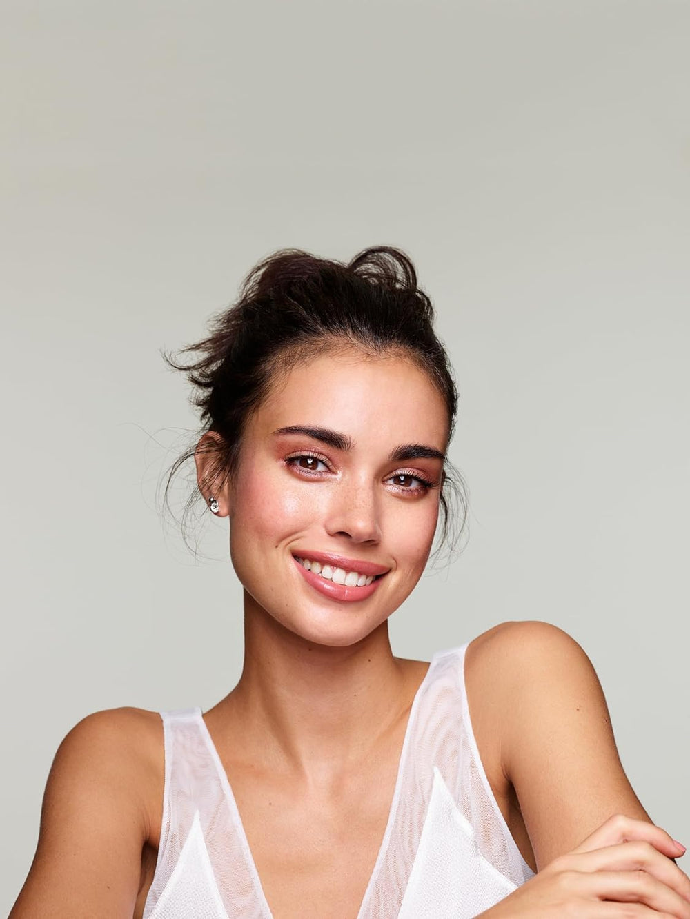 COVERGIRL blush applied on model cheek illustrating natural flush and everyday wear benefit