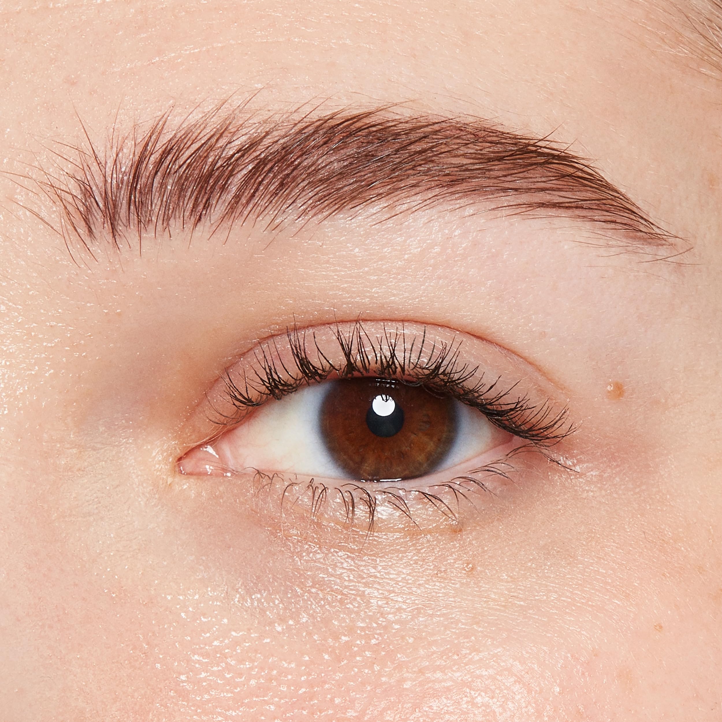 COVERGIRL spoolie grooming brows to blend color for natural finish