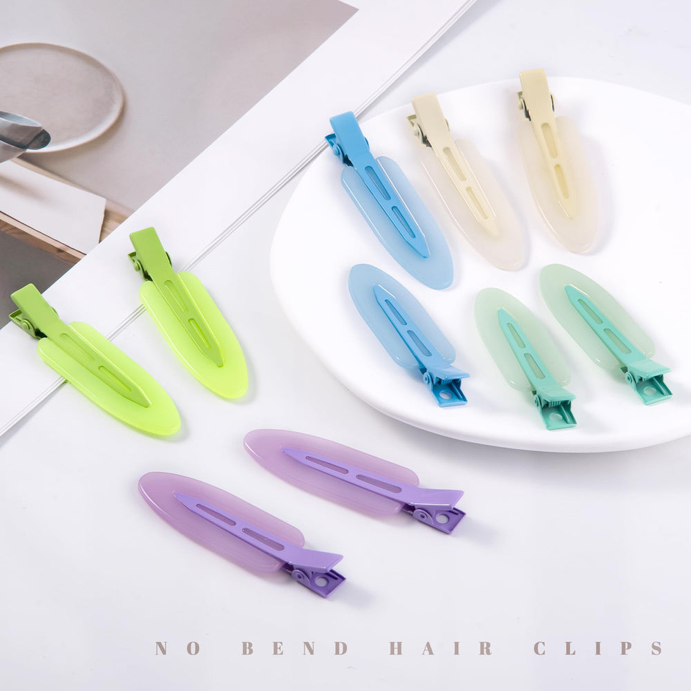 Cptots clip securing bangs and bun in use for non-slip hold during styling