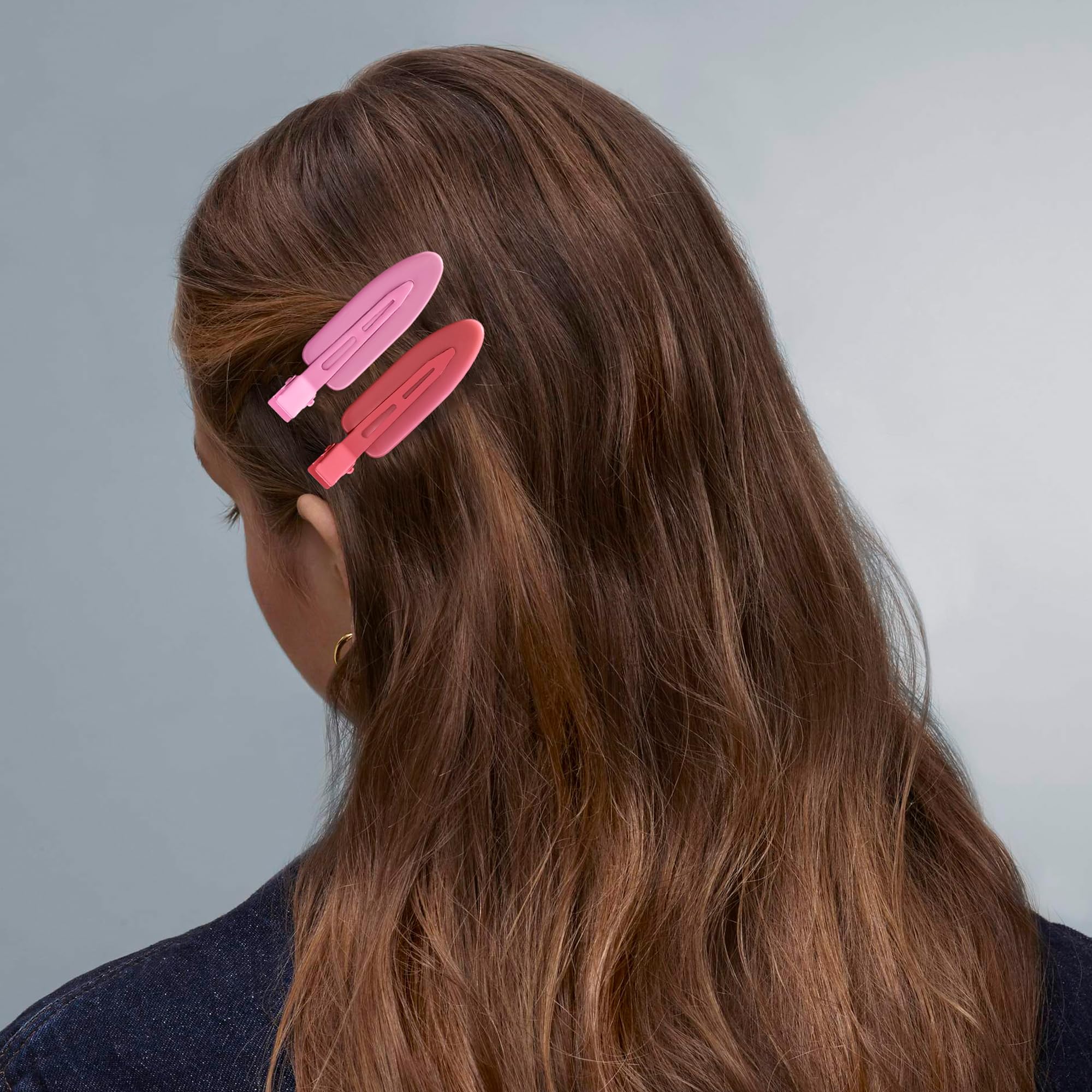 Cptots securing bangs during makeup application with reliable hold