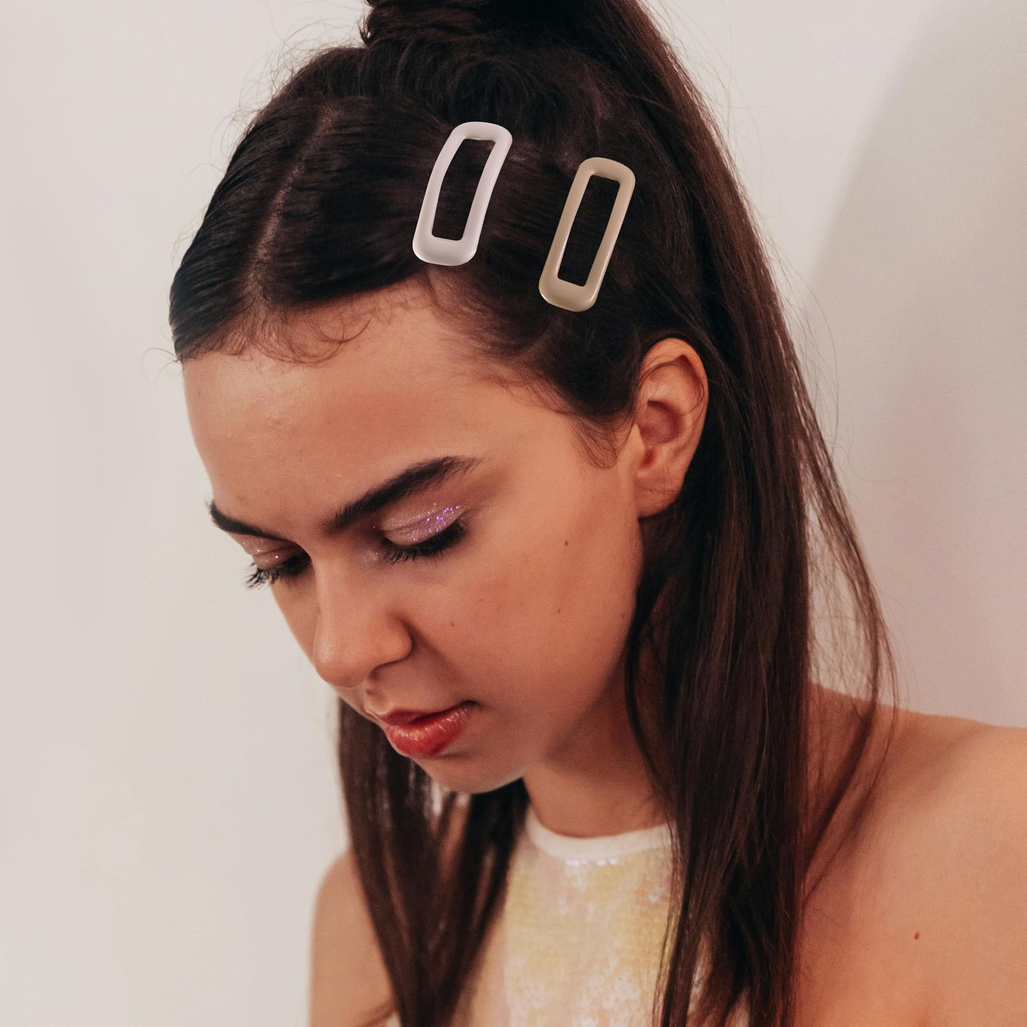 Cptots clips in bangs demonstrating discreet hold and neat styling