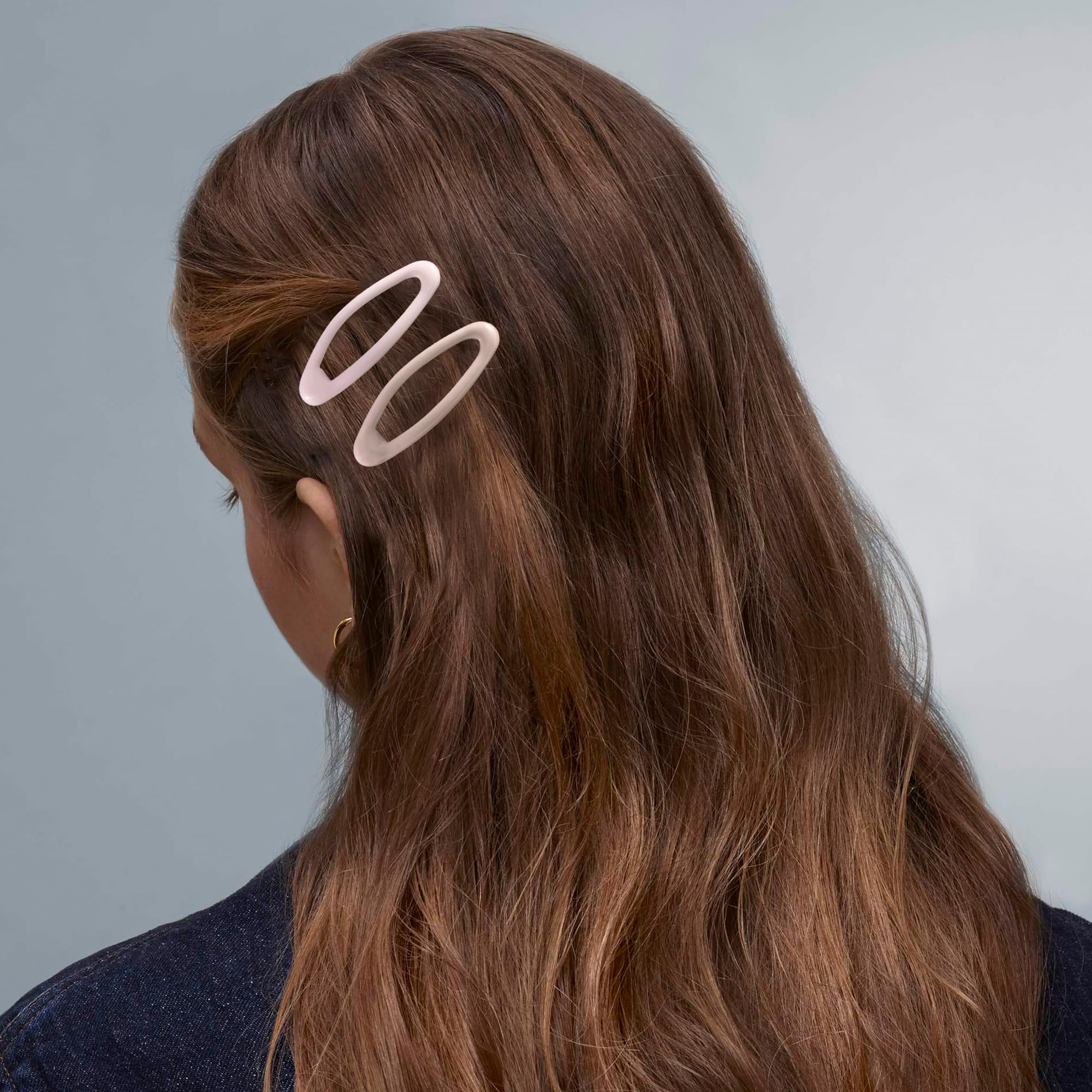 Cptots clips securing bangs to show discreet hold and neat styling benefit