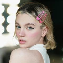 Cptots clips used in hair to hold bangs and flyaways, providing tidy, lasting styling benefit