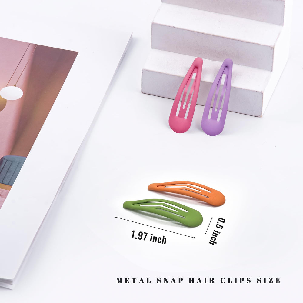 Cptots close-up water-drop shaped snap clip highlighting smooth edge and secure hold