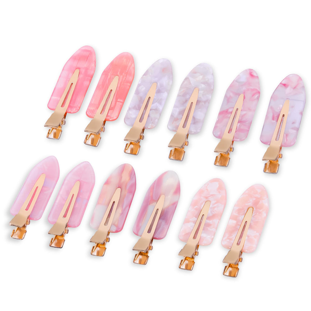 Cptots front box packaging showing twelve pink creaseless clips for travel convenience