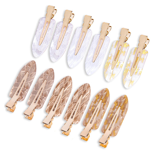 Cptots front packaging showing 12 white-gold creaseless clips, convenient storage
