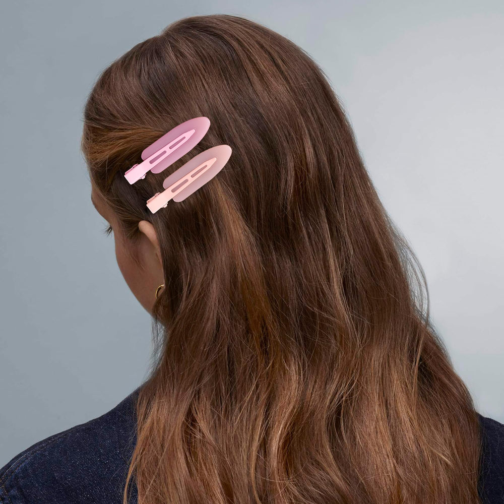 Cptots holding thick hair section demonstrating firm non-slip grip
