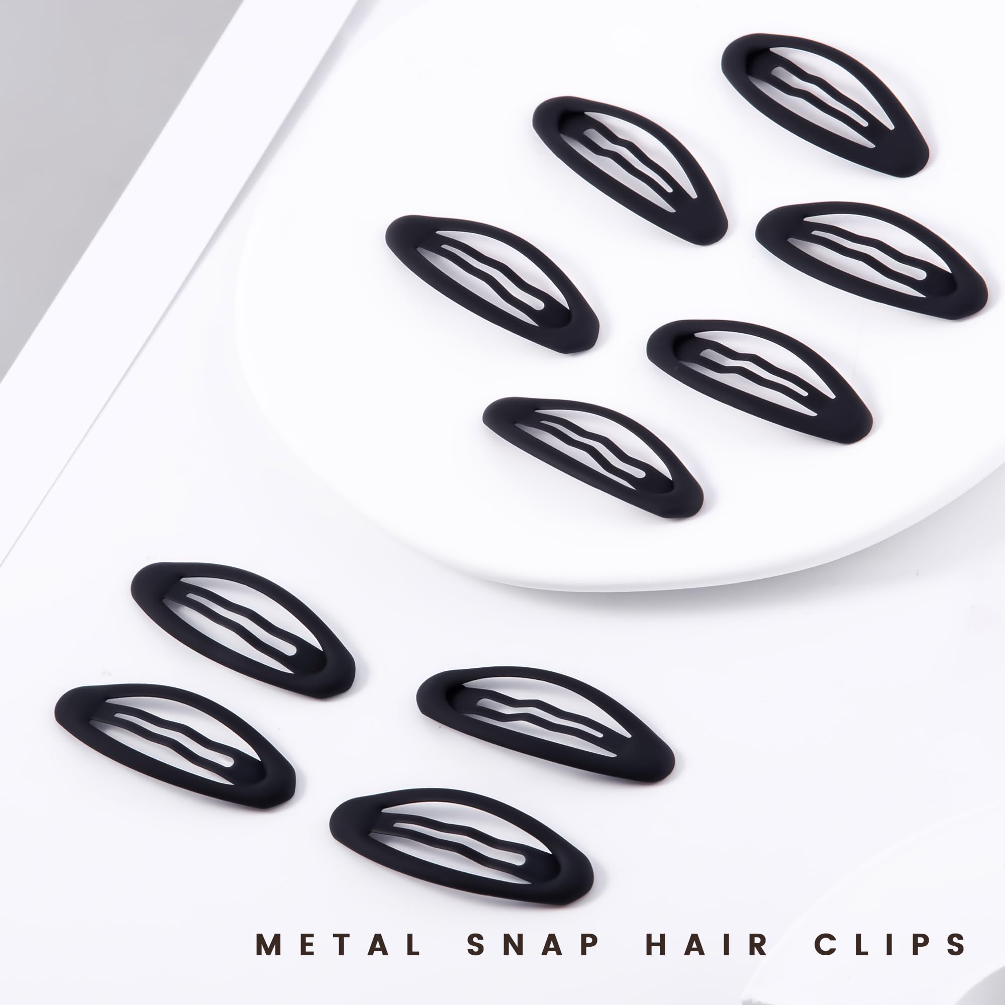 Cptots clips in hand illustrating compact 2-inch size and portability