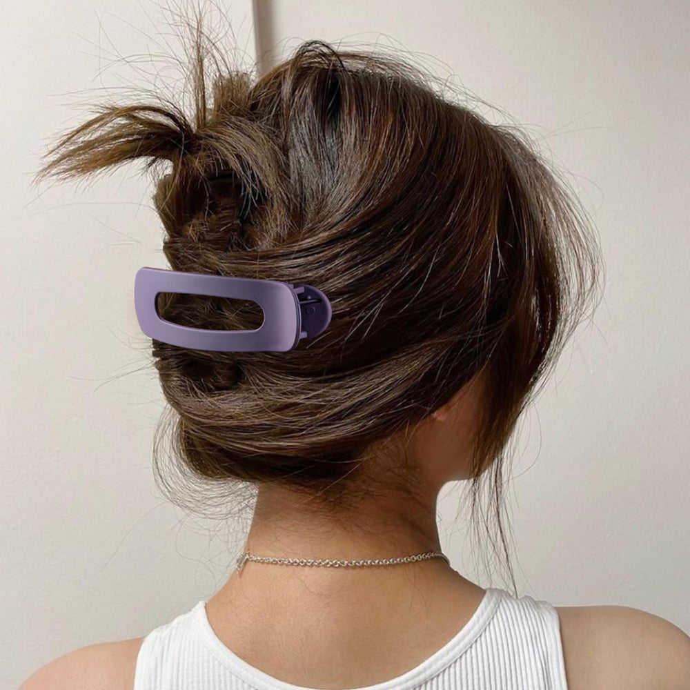 Cptots lifestyle image of woman wearing clip while working to show comfortable everyday use