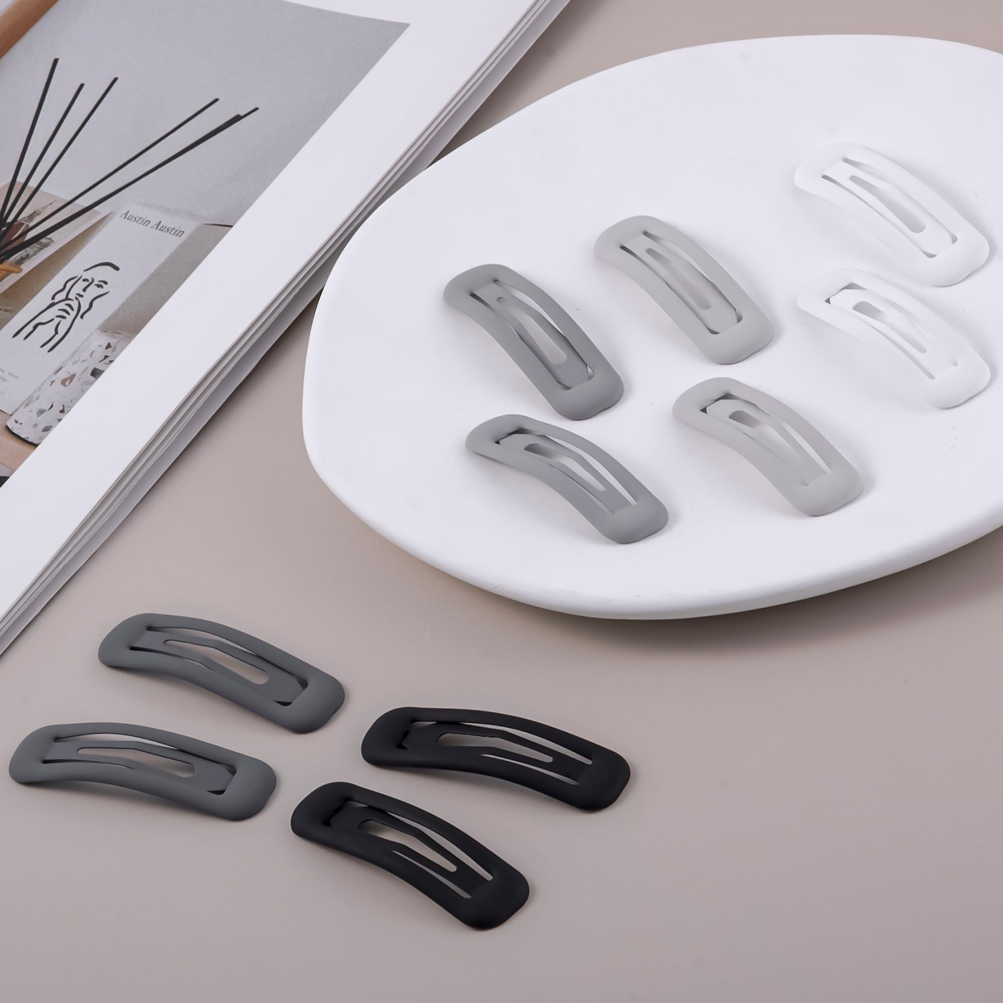 Cptots trio of matte black gray white barrettes displayed - easy outfit matching