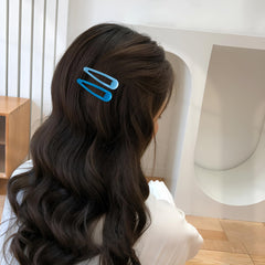 Cptots size scale clip beside ruler showing 1.97-inch compact length