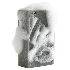 Crate 61 Organics soap lather in hand demonstrating gentle cleansing benefit