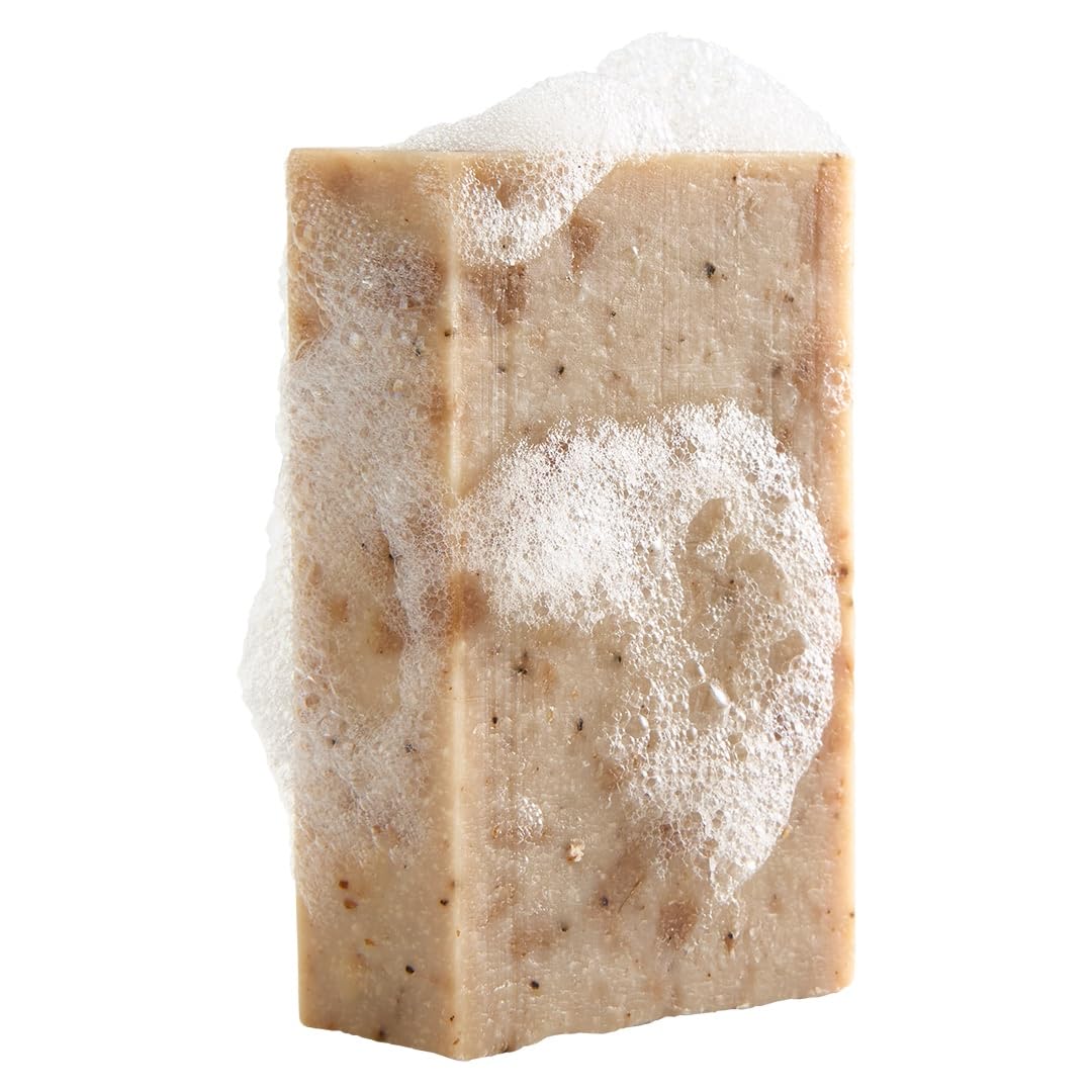 Crate 61 Organics lather in hand demonstrating rich foam and gentle cleanse benefit