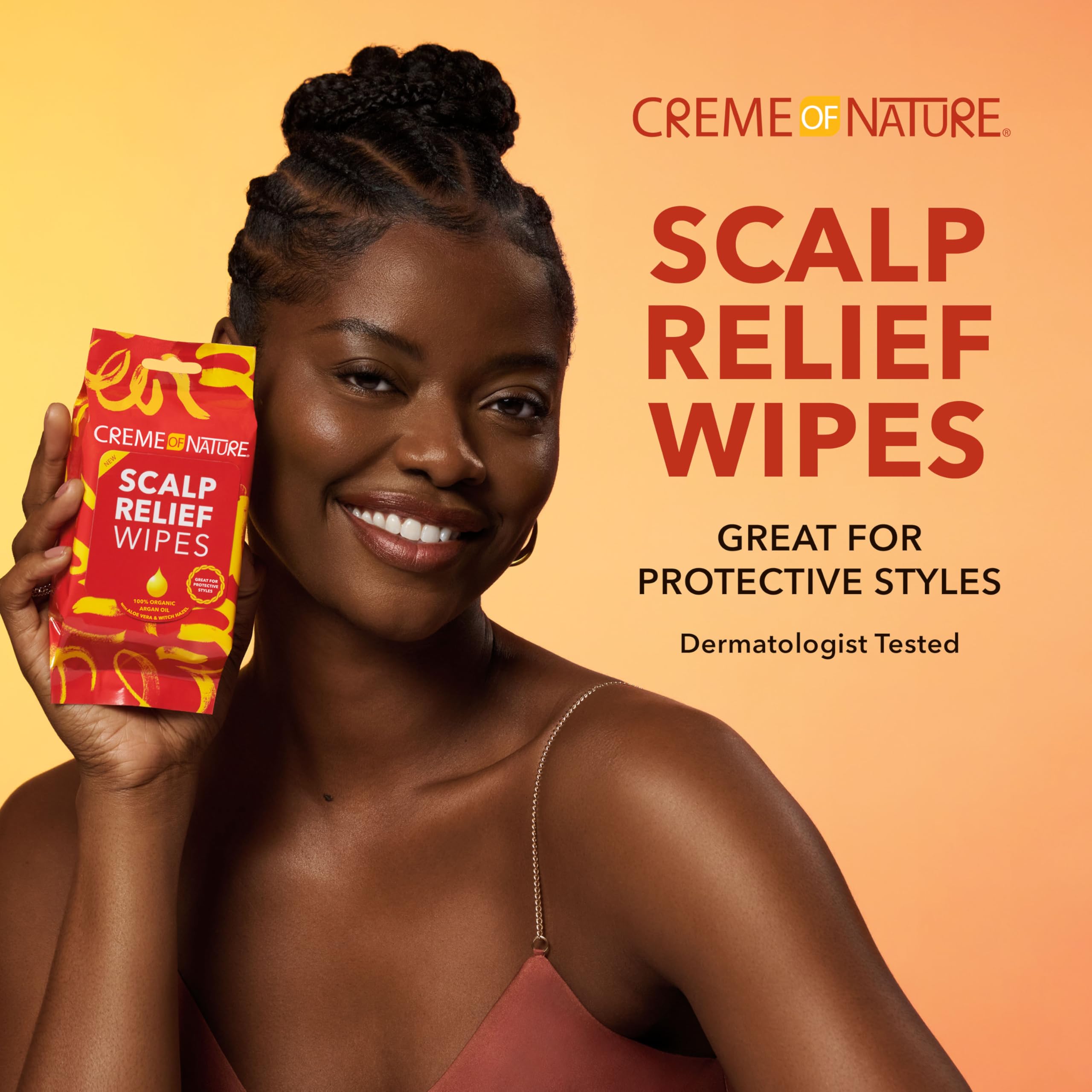 Creme of Nature argan oil droplet highlighting nourishing benefit