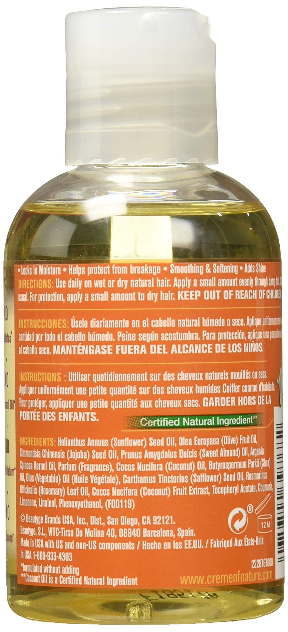 Creme of Nature oil texture on hand, shows smooth shine and easy application benefits