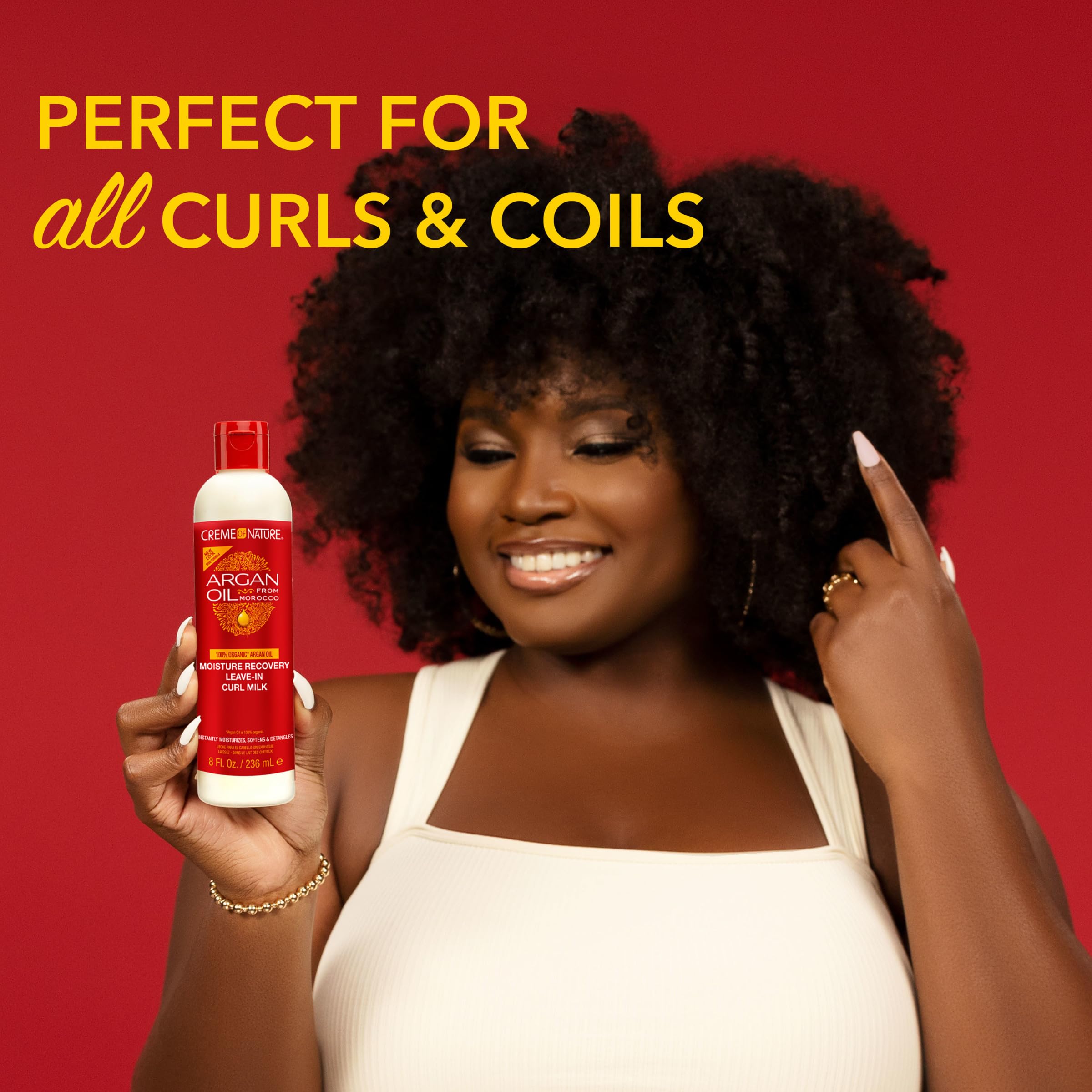 Creme of Nature curl milk texture close-up showing non-greasy absorption benefit
