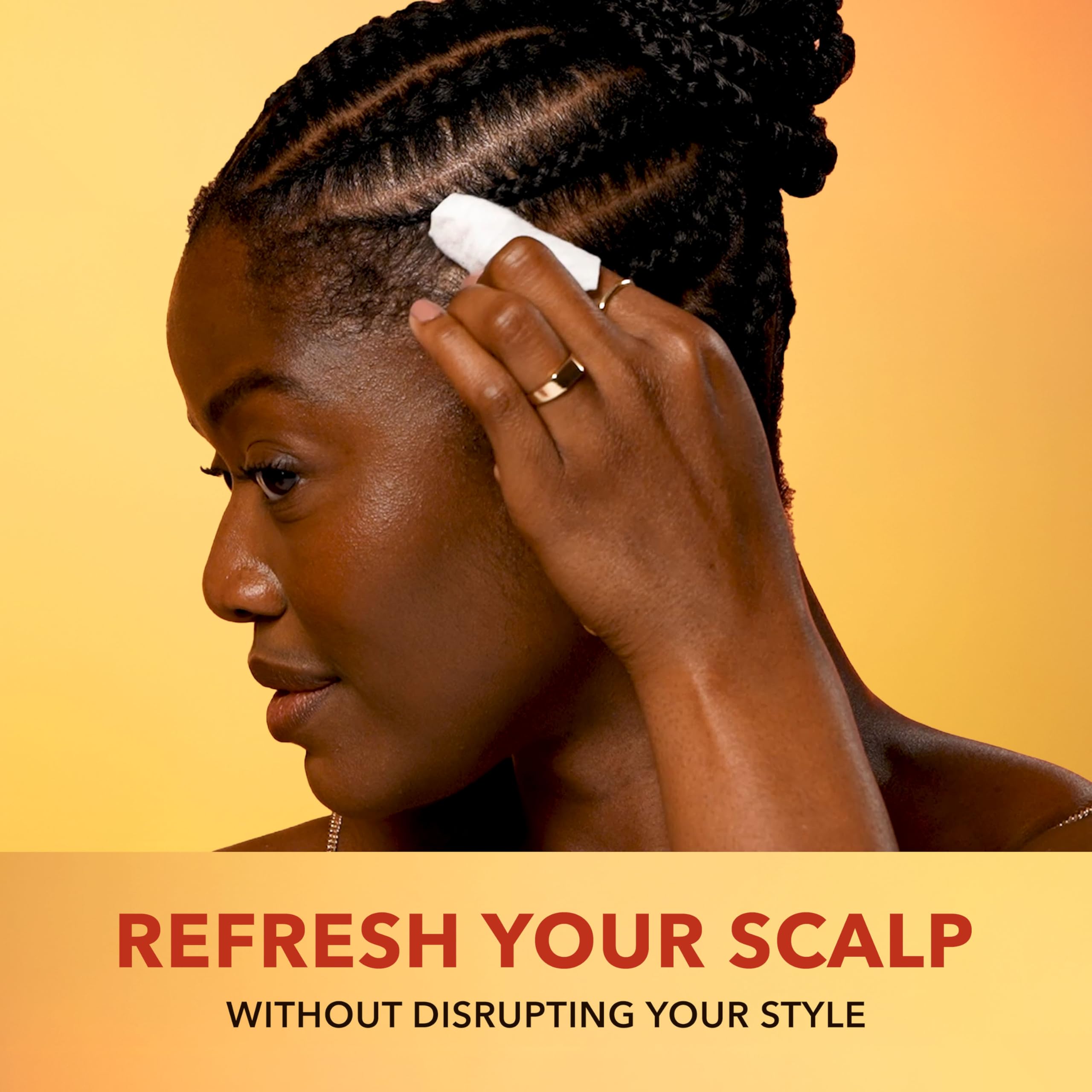 Creme of Nature slim pack beside phone indicating travel-ready benefit