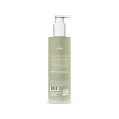 Cremo pear blossom next to everyday objects showing 16 fl oz scale for purchase clarity