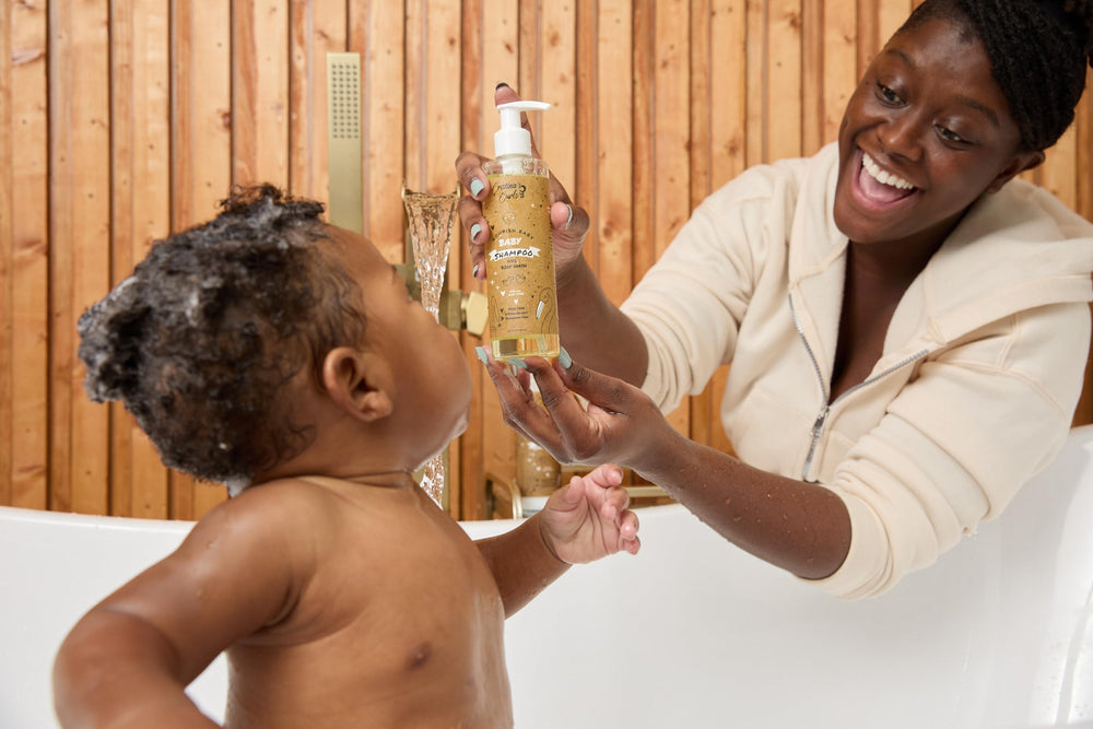 Cristina's Curls baby in bath using the set for a calmer, gentler wash