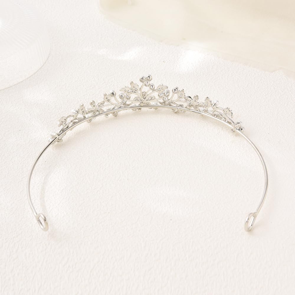 CROWNFAN with veil attached using loops showing layering versatility benefit