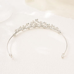 CROWNFAN with veil attached using loops showing layering versatility benefit