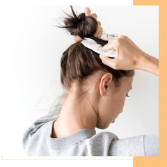 Crowye scrunchie worn on wrist in lifestyle scene for convenience benefit