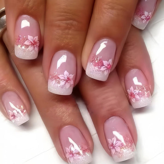 CTTHNBD close-up of floral French tip detail highlighting delicate design and polish